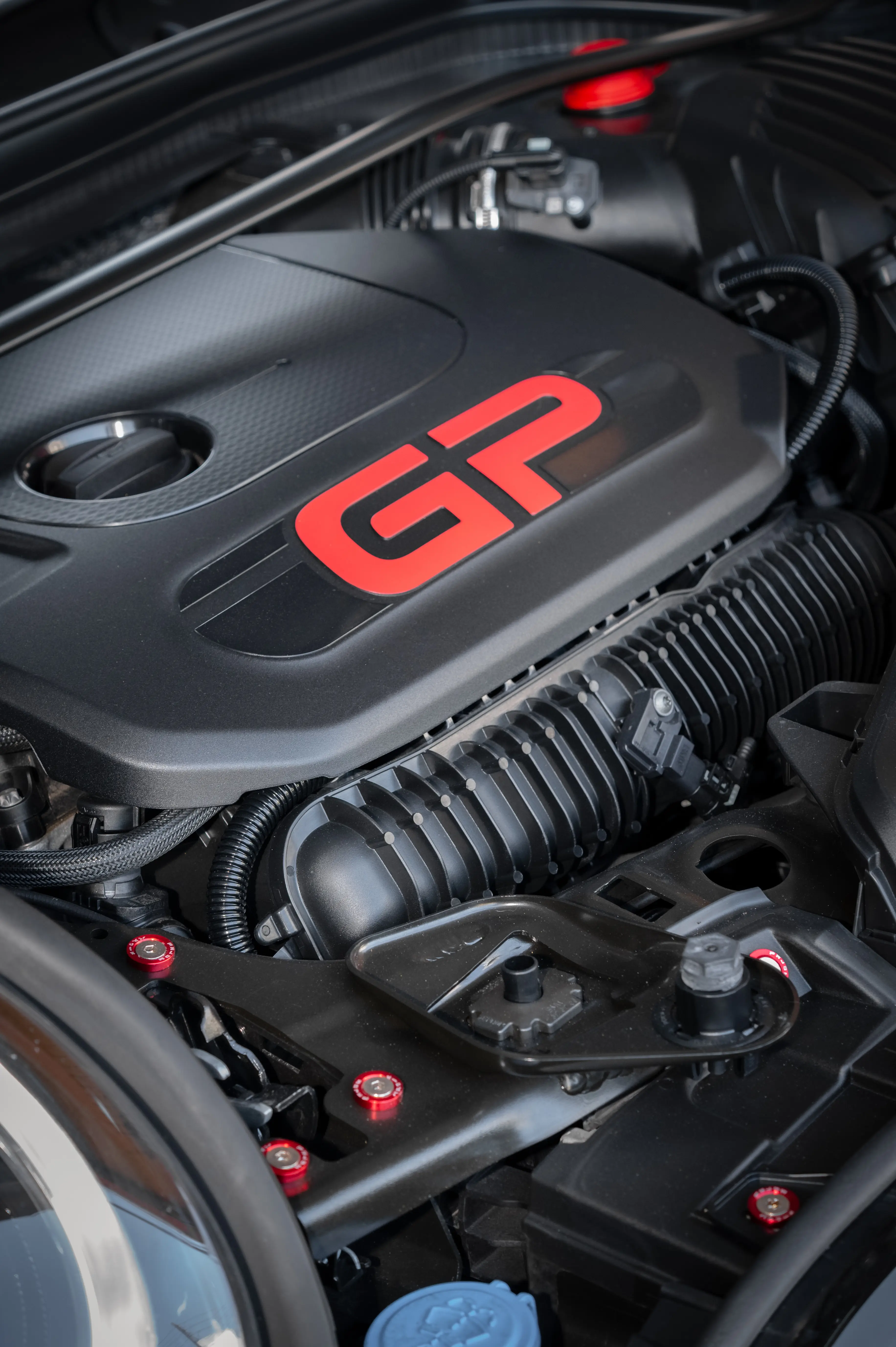 High-performance engine bay detail at MILIKOUROS Car Services